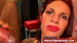 Busty redhead babe loves to swallow cum after hot bukkake
